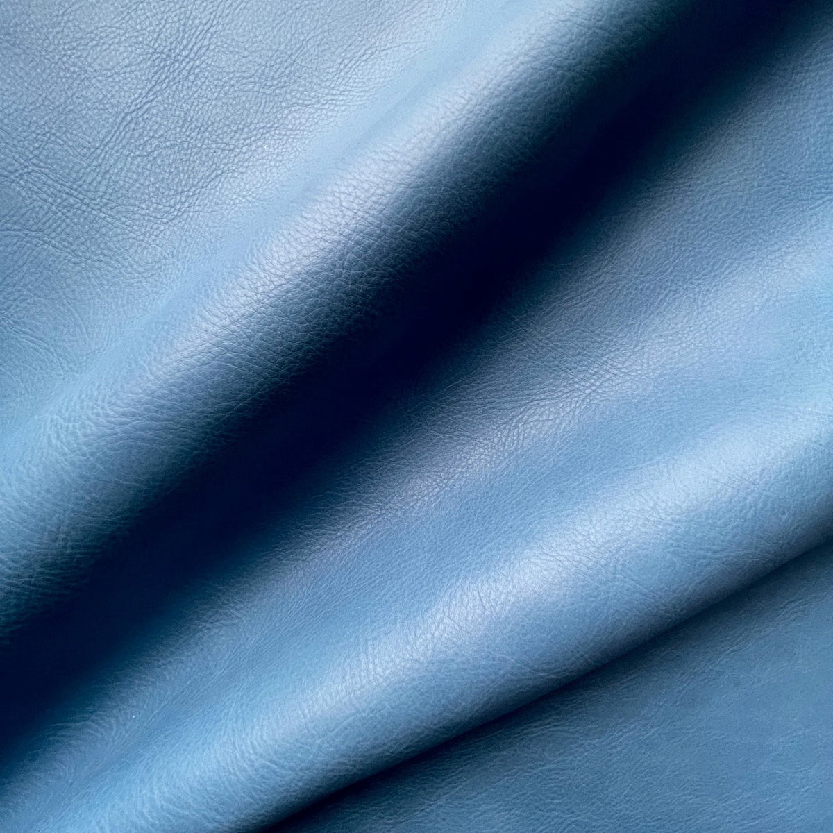 Olympia Cow Sides | Sky Blue | 1.5 mm | 21 sq.ft | From $260 ea.