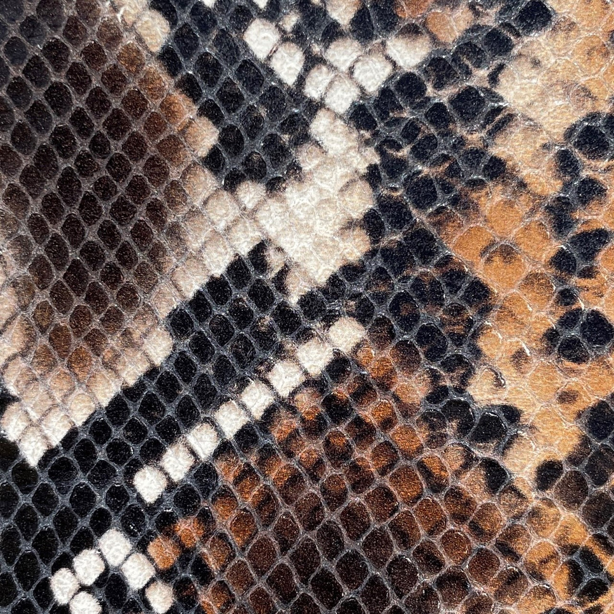 Snake Print Calf Skin | Black / Brown | 0.8mm | 7 - 10 sq.ft | $98 ea.
