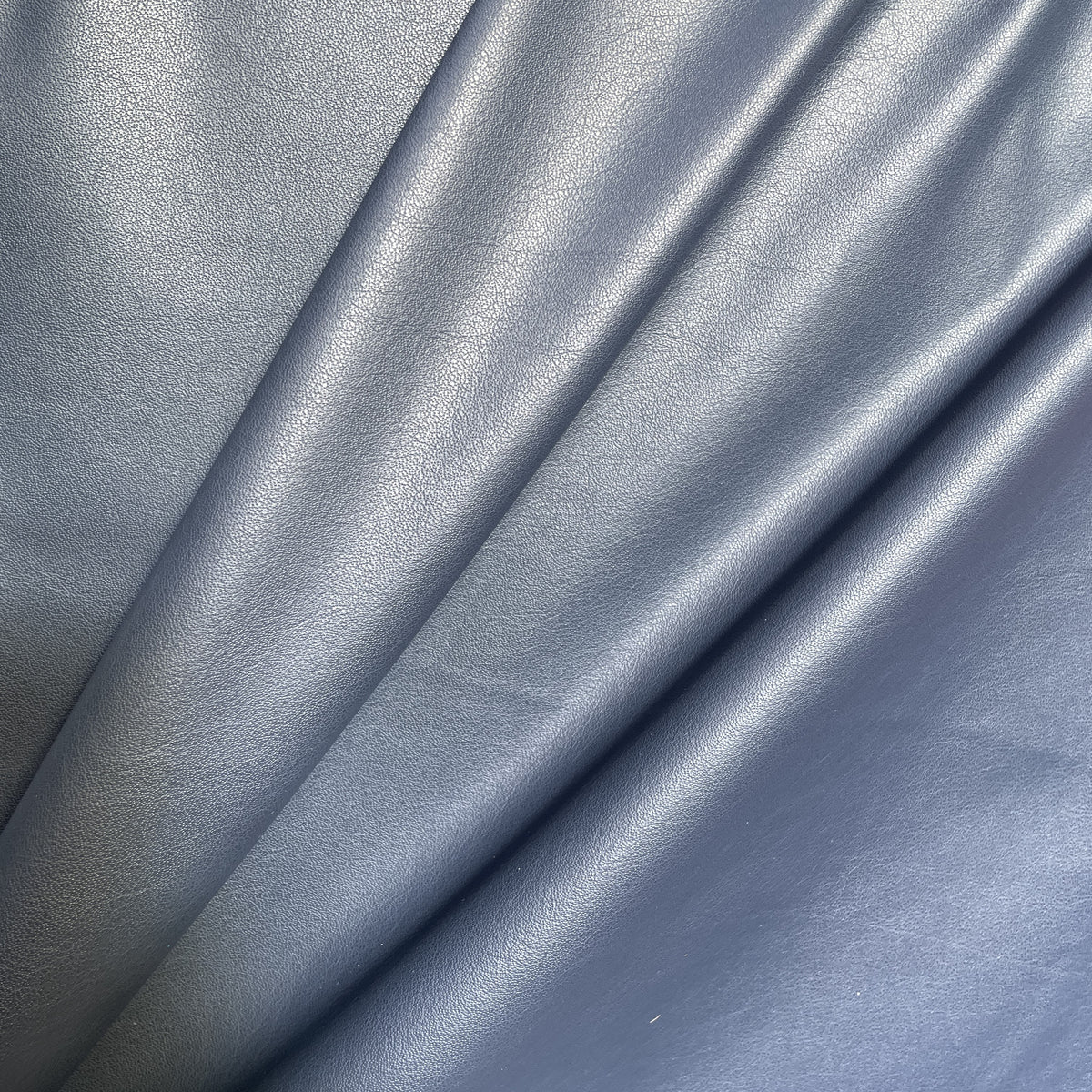 Milano Garment Cow Sides | Navy | 0.6 mm | 25 sq.ft | From $230 ea.