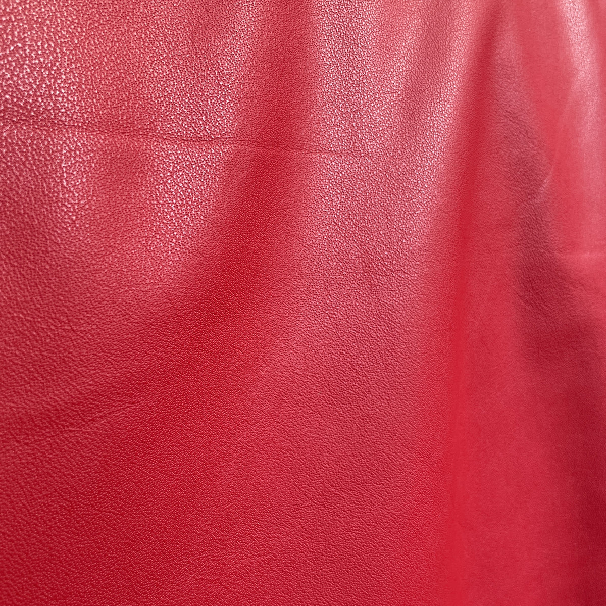 Milano Garment Cow Sides | Red | 0.6 mm | 25 sq.ft | From $230 ea.