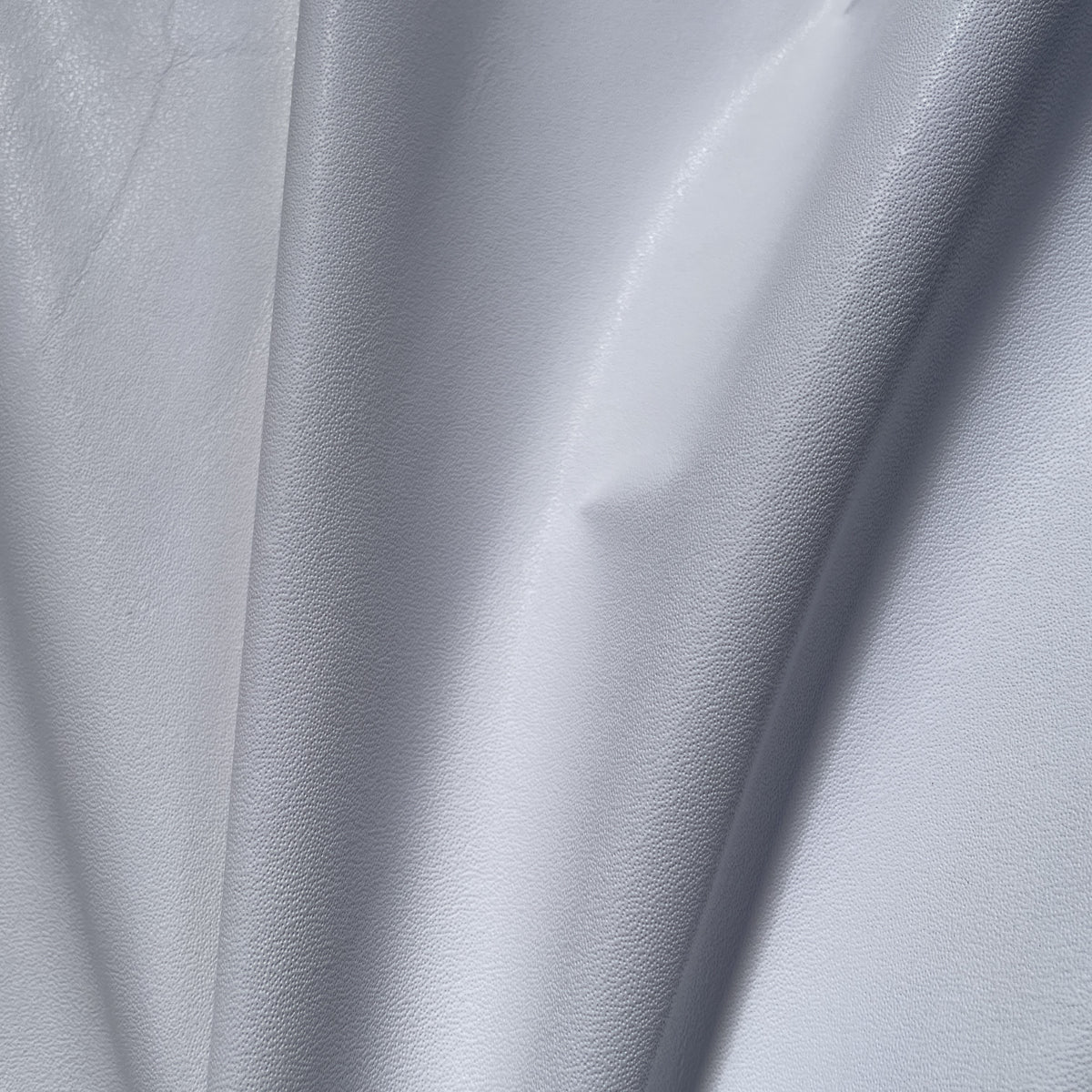 Milano Garment Cow Sides | White | 0.6 mm | 25 sq.ft | From $230 ea.